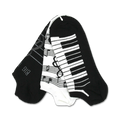 Three ankle socks: one black with musical notes, one white with piano keys, and one black with piano keys. All feature black and white designs.