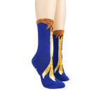 Lifestyle shot of Chicken Feet Non-Skid Slipper socks on a model's legs.