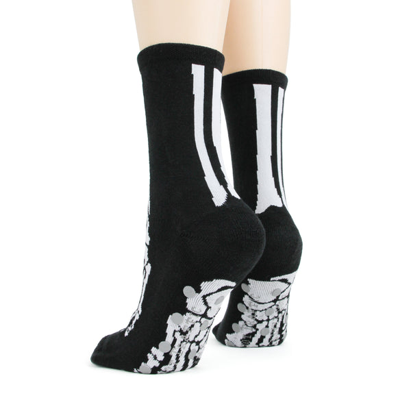 Close-up shot of the bottom of the black skeleton socks highlighting the grey non-skid dots. [lf]