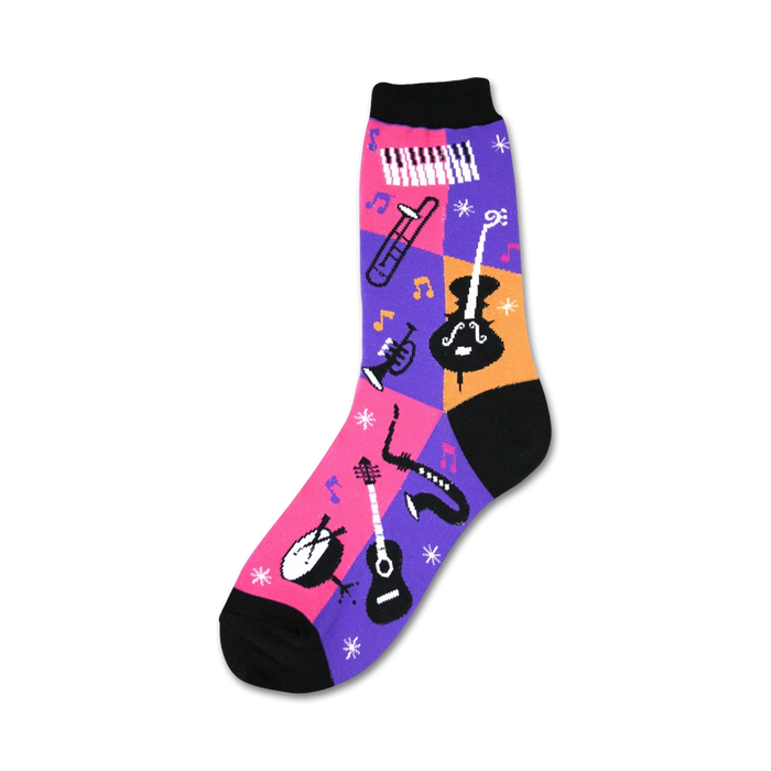  black crew socks with colorful musical instruments, including drums, guitars, saxophones, trumpets, and pianos, as well as musical notes and stars.    }}