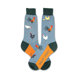 mens crew socks in blue with cartoon roosters, hens and the word "feelin\' cocky" displayed across the top of the feet.    