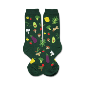 womens crew socks with a green background and food & drink pattern of vegetables such as: tomatoes, mushrooms, cauliflower, eggplant, avocado, ginger root, bell peppers, and carrots.  