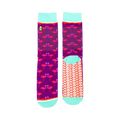 Pair of crew socks. Purple background with pink flamingo design. Teal cuffs and orange scale pattern on the soles.