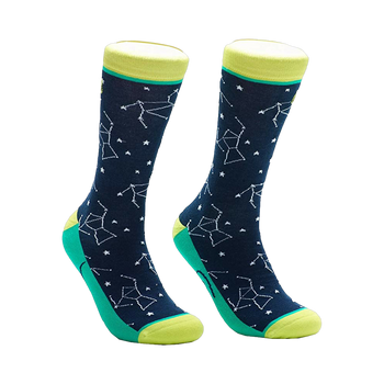Pair of navy blue crew socks with a constellation and star pattern, accented with teal and yellow cuffs. 