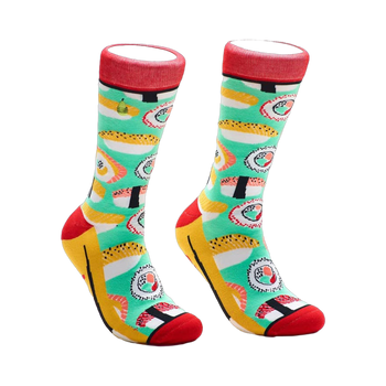 Pair of crew socks with a teal background and colorful sushi illustrations. Red, yellow, and black accents.