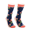 A pair of navy blue crew socks with a pattern of coral peonies and green stems. The socks have a coral-colored cuff.