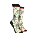 Pair of cream crew socks featuring a black spiderweb design, black spiders, and small lime green cupcake accents.