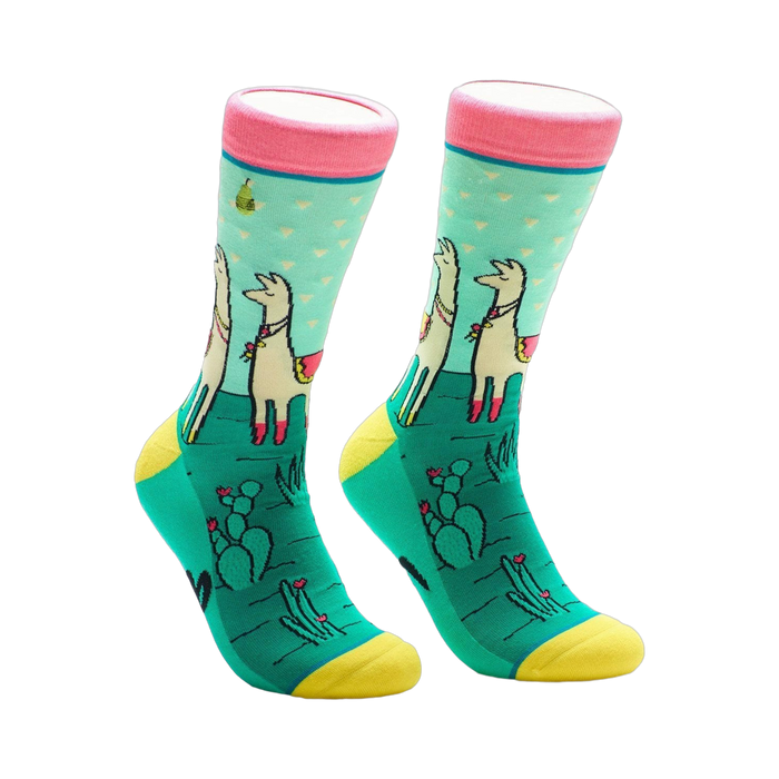 Crew socks in teal, pink, and yellow.  Llamas wearing flower crowns stand in a cactus landscape on a pastel blue background. }}
