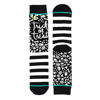 Pair of black and white striped crew socks. One sock features 'Trick or Treat' in script with Halloween-themed illustrations. Teal accents on cuffs.