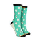 Pair of women's crew socks. Teal background with repeating pattern of small white ghosts. Black and orange cuffs.