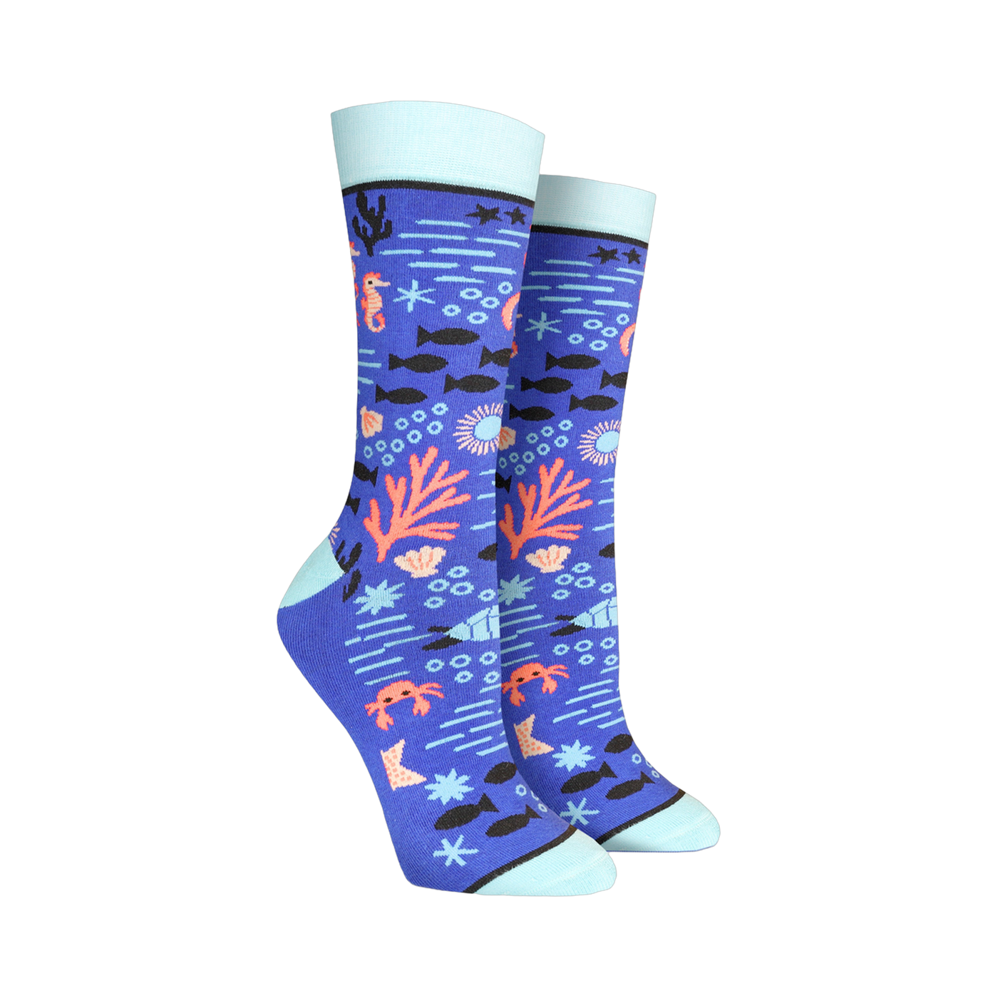 A pair of women's crew socks in blue, adorned with a whimsical undersea design featuring seahorses, coral, fish, and crabs.