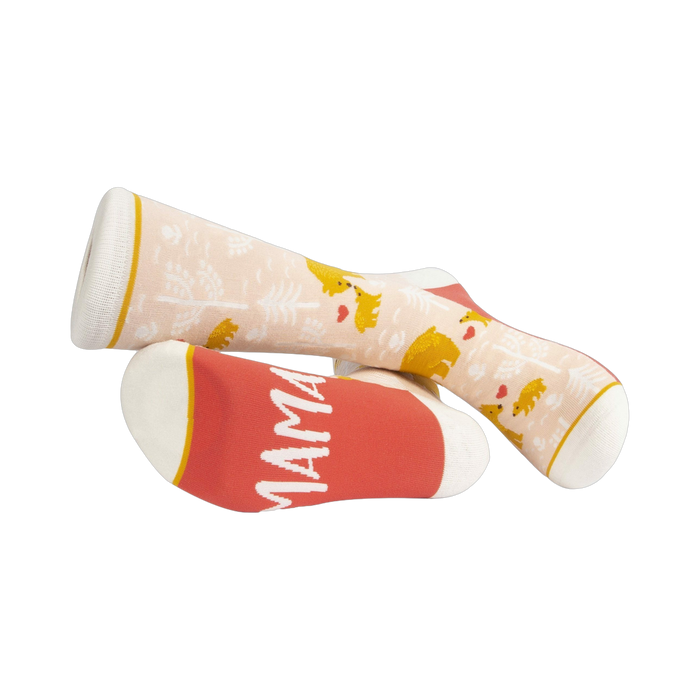 Lifestyle shot of Mama Bear socks on a person's feet, showcasing how they look when worn.