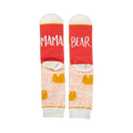 Pair of women's crew socks. Peach background with gold bear design. Red heel and toe with 'Mama Bear' text.