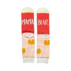 Pair of women's crew socks. Peach background with gold bear design. Red heel and toe with 'Mama Bear' text.