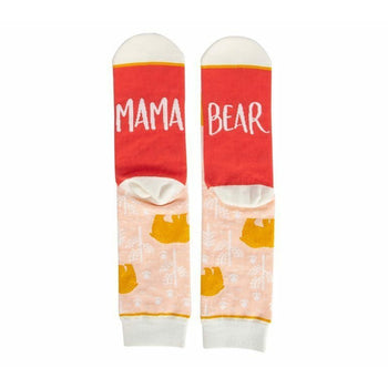Pair of women's crew socks. Peach background with gold bear design. Red heel and toe with 'Mama Bear' text.