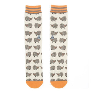 Pair of 'Looking Sharp' hedgehog socks laid flat, showcasing the full design.