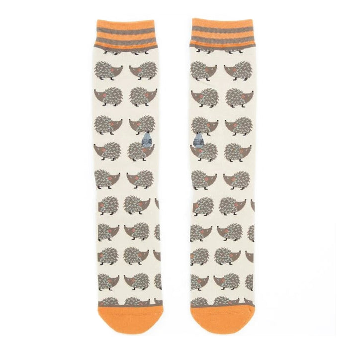 Pair of 'Looking Sharp' hedgehog socks laid flat, showcasing the full design.