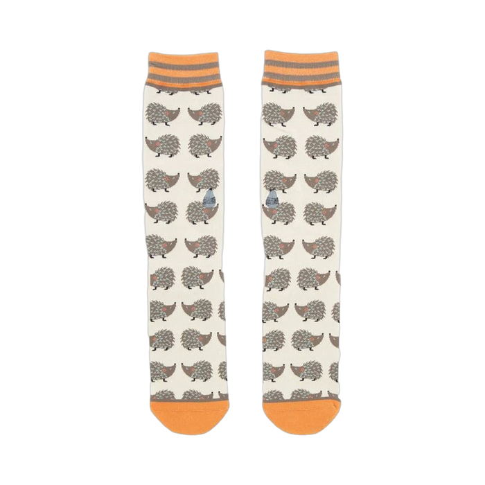 Pair of 'Looking Sharp' hedgehog socks laid flat, showcasing the full design.