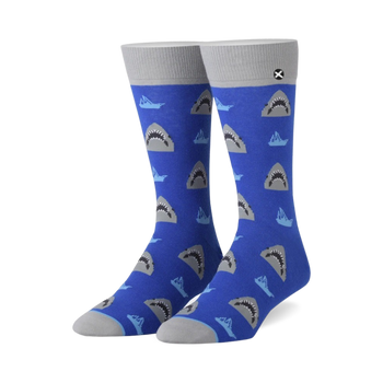 blue crew socks with a grey great white shark pattern facing different directions