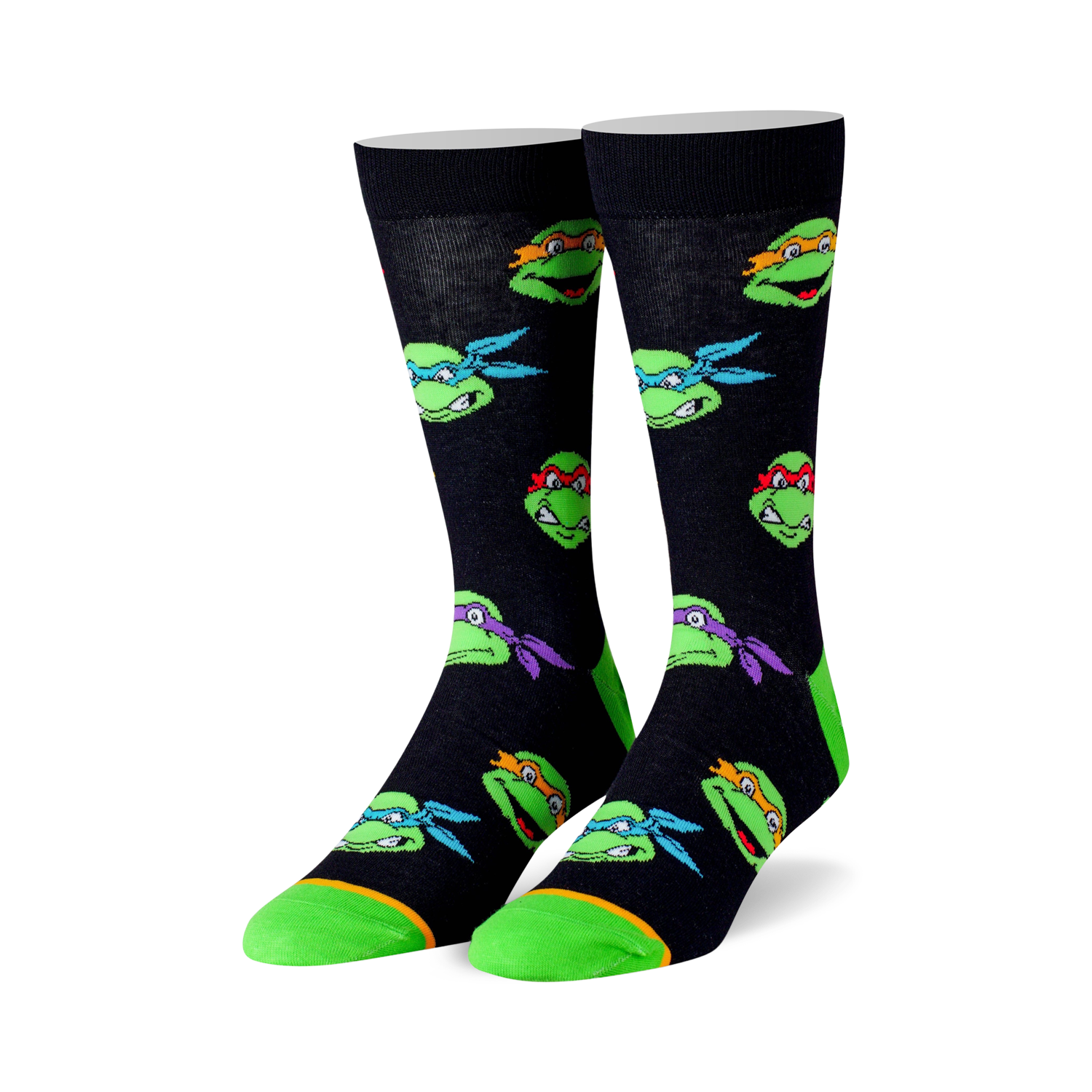 Crew socks in black with colorful Teenage Mutant Ninja Turtle head graphics. Lime green accents on the toes and heels.