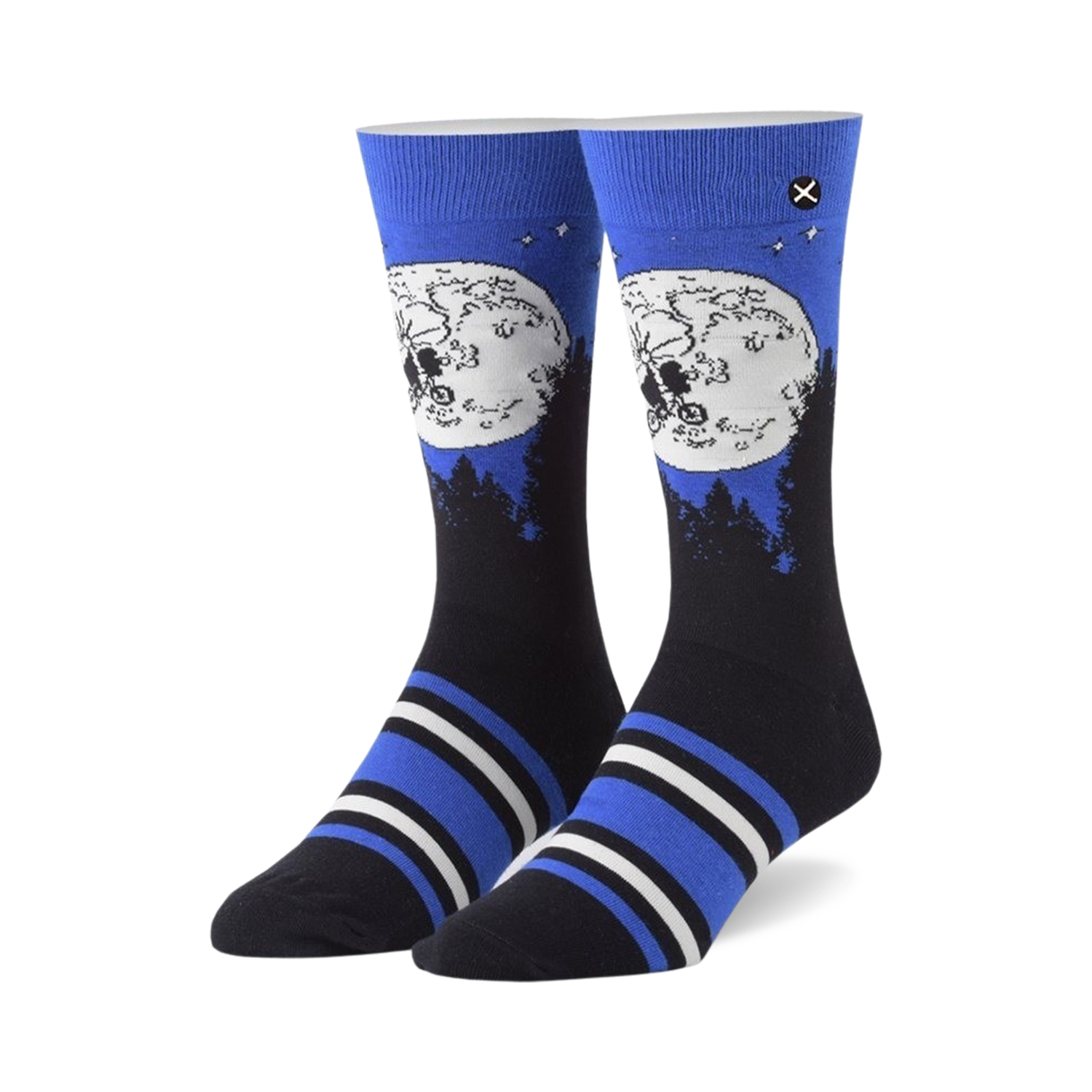 Pair of crew socks showcasing ET and Elliot silhouetted against a full moon on a dark blue background. Blue, black, and white stripes near the cuff.