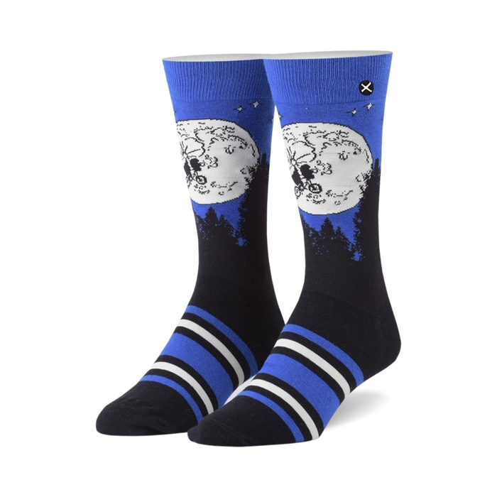 blue crew socks with a pattern of a bicycle, moon, and trees. inspired by the movie et, these socks are a fun and stylish way to show your love for the classic film.   }}
