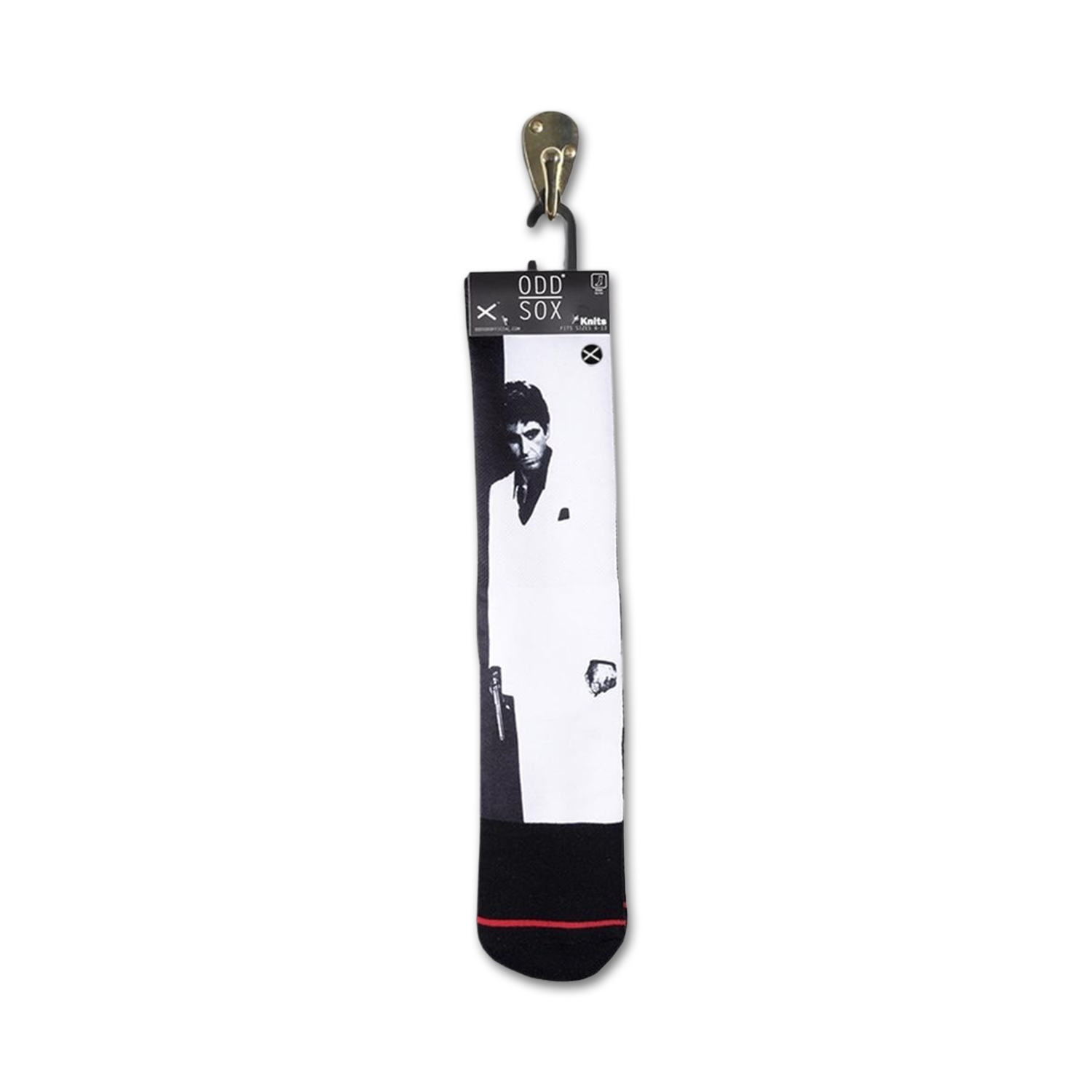 Close-up of Scarface socks hanging on a retail display tag.