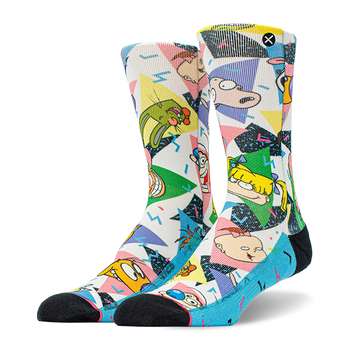 Pair of crew socks with a white base, featuring colorful 90s geometric patterns and Nickelodeon cartoon characters like Ren, Stimpy, and Rugrats. Black toes and blue heels.