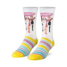 women's white crew socks featuring clueless characters cher, dionne, tai, and murray. embroidered clueless logo. yellow toe, heel, and cuff. blue and pink stripes at cuff.  