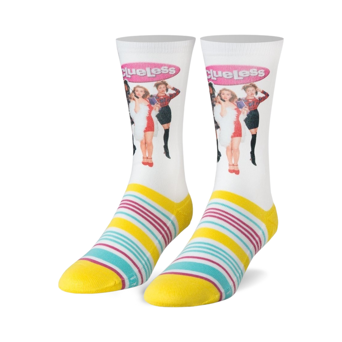 women's white crew socks featuring clueless characters cher, dionne, tai, and murray. embroidered clueless logo. yellow toe, heel, and cuff. blue and pink stripes at cuff.   }}