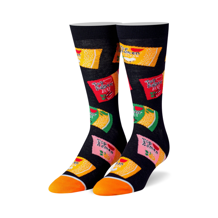 black crew socks with a pattern of red, yellow, orange, and pink top ramen noodle packages.   }}