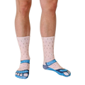 Close-up shot of Socks and Sandals Pale socks, showcasing the detail of the hairy leg and sandal design. [lf]