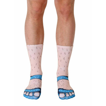 white crew socks with hairy light brown feet wearing blue sandals.  