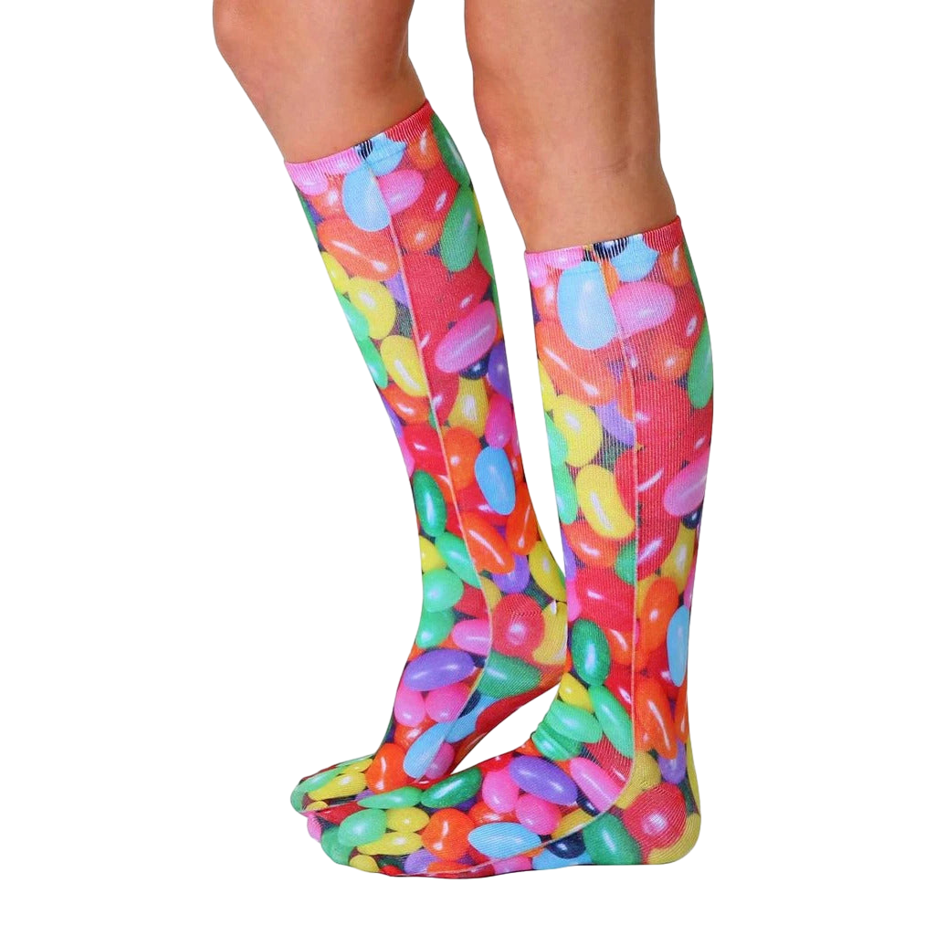 Lifestyle shot showing the Jelly Bean knee-high socks on a person's legs from the side. [lf]