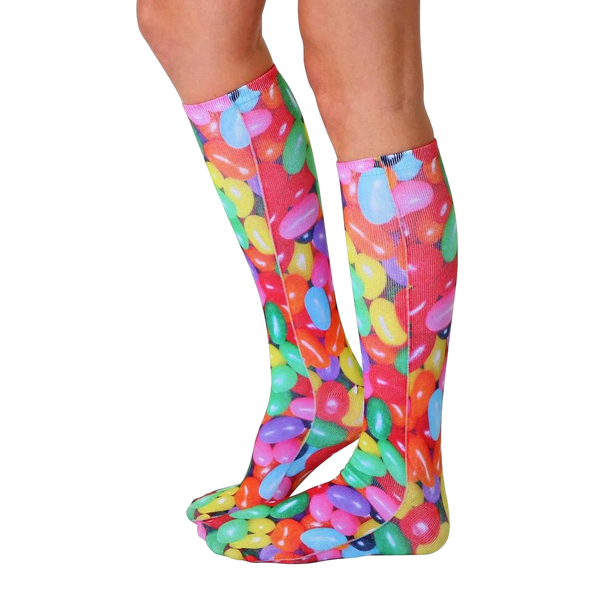 Lifestyle shot showing the Jelly Bean knee-high socks on a person's legs from the side. [lf]