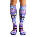 Pair of knee-high socks with a purple, pink, and blue galaxy print.  The print features various dog breeds and donuts. [lf]