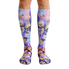 Pair of knee-high socks with a galaxy print. Kittens enjoying various foods like pizza and tacos are featured throughout the design. [lf]