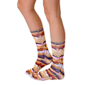 Lifestyle shot of Stacked Donut socks on a person's feet, showing the socks from the side. [lf]