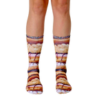 A pair of crew socks with a stacked donut design. The socks are primarily brown, pink, and white, with sprinkles. [lf]