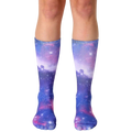 Pair of crew socks showcasing a vibrant galaxy print in shades of purple, pink, and blue. The design features nebulae and sparkling stars. [lf]