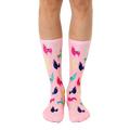 Pink crew socks with a fun pattern of colorful llamas and cacti. [lf]