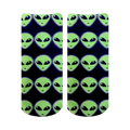 Pair of ankle socks with an all-over pattern of light green alien faces on a navy blue background.