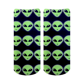 Pair of ankle socks with an all-over pattern of light green alien faces on a navy blue background.