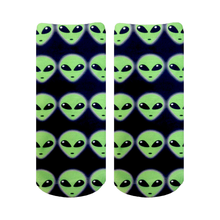 Pair of ankle socks with an all-over pattern of light green alien faces on a navy blue background. }}