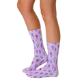 Lifestyle shot showing the Ice Cream and Sprinkles socks on a person's legs, showcasing how the socks look when worn. [lf]