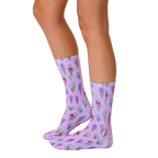 Lifestyle shot showing the Ice Cream and Sprinkles socks on a person's legs, showcasing how the socks look when worn. [lf]