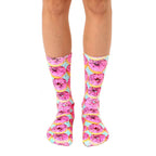 Pair of crew socks with a pink donut pattern on a pastel blue background. Fun and quirky style! [lf]