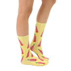 Lifestyle shot showing the hot sauce socks on a person's feet.  The socks are styled with a casual outfit. [lf]