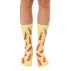 Crew socks in yellow with a repeating pattern of red and green hot sauce bottles. Fun and quirky design. [lf]