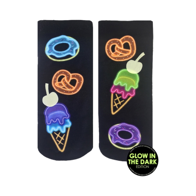 Pair of black ankle socks with neon glow-in-the-dark donuts, pretzels, and ice cream cones. 